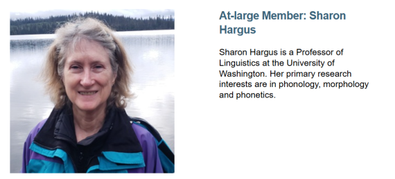 Sharon Hargus smiling in front of a lake. To her right is the except of her background and her new title as an at large member.