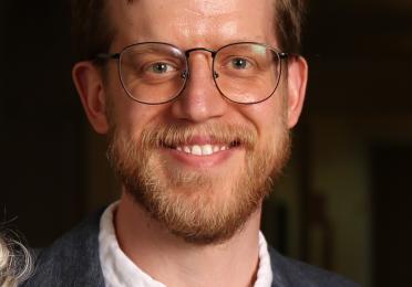 Portrait of Andrew Hedding at 2026 Linguistics Graduation