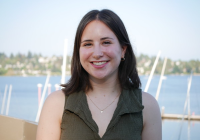 Adeline Braverman smiling near open water
